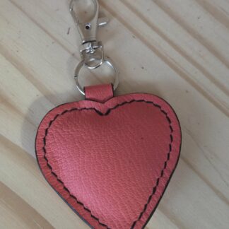 Porte clef/bijoux de sac coeur   rose orangé cousu noir