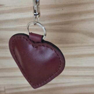 Porte clef/bijoux de sac coeur rouge couture noir
