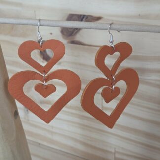 Boucles d'oreilles doubles cœurs entrelacés orange